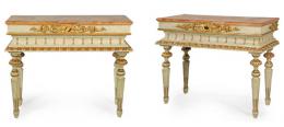 Lote 1202: Pareja de consolas estilo Carlos IV en madera de pino pintada, con tapa marmorizada, patas tronco cónicas y decoración tallada y dorada de motivos vegetales.
España, finales S. XIX