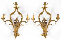Lote 1515: Pareja de apliques de estilo Luís XV en bronce dorado, S. XX.
