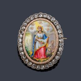Lote 2011: Broche ovalado con La Imagen de Santa Casilda de Toledo en esmalte policromado y orla de diamantes talla rosa.