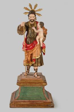 1045   -  Lote 1045: Escuela Española último tercio S. XVIII
"San José con el Niño"
Escultura de madera tallada policromada, dorada y estofada con ojos de cristal. 