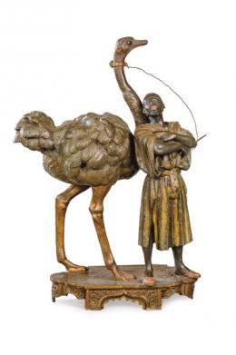 1066   -  Lote 1066: Escuela Austriaca h. 1900
"Arabe con Avestruz"
Escultura en metal policromado.