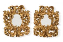 Lote 1211: Pareja de espejos barrocos en madera tallada, calada y dorada.
España, S. XVIII