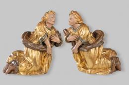1229   -  Lote 1229: Escuela Flamenca ff. S. XVI
"Pareja de Angeles Arrodillados"
Esculturas de medio bulto en madera tallada, policromada y dorada.
