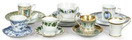 1516   -  Lote 1516: Conjunto de 7 tazas de café con leche en porcelanas Goebel, Schumann Moabit, Jugendstil Meissen, Meissen y Royal Copenhagen blue Fluted Full Lace