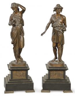 Lote 1542: "Mujer con Uvas" y "Hombre con Manzana" pareja de esculturas en bronce patinada, Francia S. XIX.