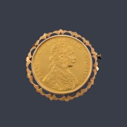 Lote 2664
Broche en oro amarillo de 18 K enmarcando una moneda de Francisco I de 4 coronas.