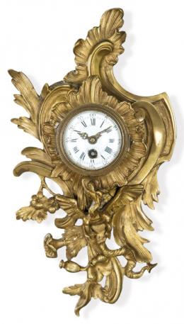 Lote 1043: Reloj tipo cartel de pared Napoleón III en bronce dorado, estilo Luis XV. ff. S. XIX.