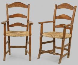 Lote 1107: Pareja de butacas en madera de nogal con patas unidas por chambranas y asientos de enea. Francia, finales siglo XX