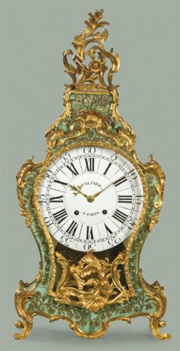 1250   -  Lote 1250
Reloj de sobremesa rococó Luis XV. Esfera y maquinaria firmada por Pailard. Francia, 2ª mitad S. XVIII.