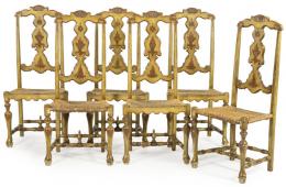 Lote 1285: Conjunto de 10 sillas siguiendo modelos del siglo XVIII en madera de pino torneada, tallada y pintada con asiento de enea. Siglo XX 
