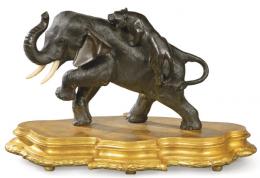 Lote 1379: Genryusai Seiya, Japón Periodo Meiji h. 1900
"Elefante Atacado por Tigre"
En bronce patinado
