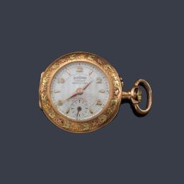 Lote 2519: DOGMA, reloj lepín de colgar con caja en oro rosa de 18 K.