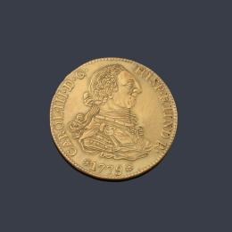 Lote 2555: Copia moneda Carlos III, 8 escudos Sevilla 1779 CF en oro de 18 K.