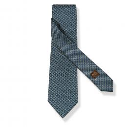 Lote 2575: Corbata Hermès Figuras geométricas con monograma en azul