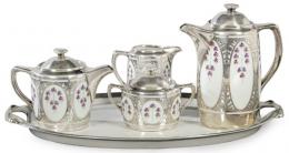 Lote 1039: Juego de café en porcelana esmaltada de Rosenthal, con decoración de flores y montura de plata. Compuesto por: Cafetera, tetera, jarra, azucarero y fuente