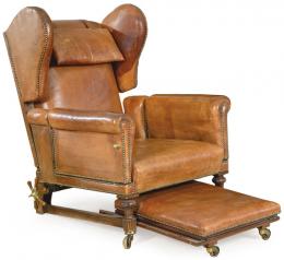Lote 1468: Butaca reclinable en madera de haya torneada con tapicería de cuero marrón. Finales S. XIX- pps. S. XX
