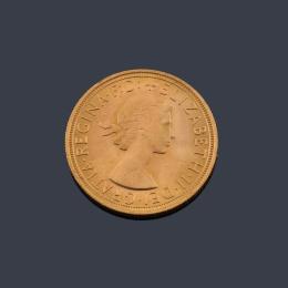 Lote 2658: Reina Isabel de Inglaterra, libra en oro de 22 K.