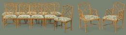 Lote 1026: Conjunto de diez sillas y dos butacas estilo Chippendale, madera torneada simulando bambú tapizadas en verde.
S. XX