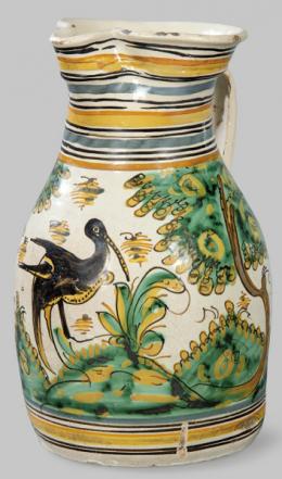 Lote 1076: Jarra de cerámica pintada y esmaltada de Puente del Arzovispo con ave zancuda entre vegetación. S. XVIII