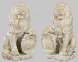 Lote 1078: Pareja de leones sentados con cartelas en cerámica esmaltada y craquelada.
S. XX

