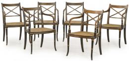 Lote 1228: Conjunto de seis sillas Regencia, estilo Sheraton en madera de caoba tallada, torneada, pintada y parcialmente dorada, con asiento de rejilla.
Inglaterra, h. 1810