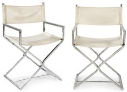 Lote 1332
Pareja de sillas de director realizadas por Virtue Bros de estilo Hollywood Regency con estructura de acero y tapicería de textil vinílico blanco. Con etiqueta de fábrica.
EE.UU, años 50