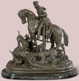 Lote 1396: Escultura en bronce de cazador con peana.