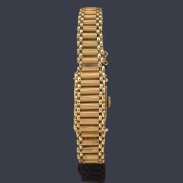 Lote 2535: MULCO reloj-pulsera de señora con caja y brazalete en oro amarillo de 18 K.