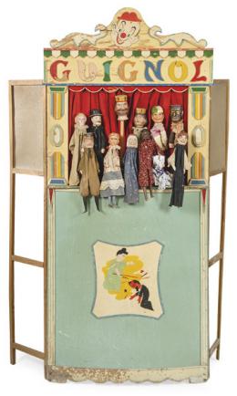 Lote 1059: Guiñol con marionetas de madera pintada años 50-60.