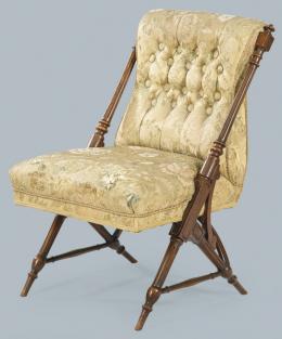 Lote 1077: Butaca en madera de roble tallada y torneada con tapicería de seda adamascada y respaldo capitoné (algunas faltas).
Francia, principios S. XX