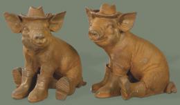 Lote 1028: Dos cerdos hierro para jardín