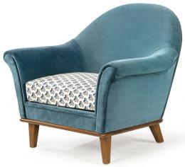 Lote 1318: Butaca con estructura de madera y patas en madera de  palisandro, tapizada en terciopelo color turquesa con el asiento en tela estampada de motivos geométricos. Italia, años 50
