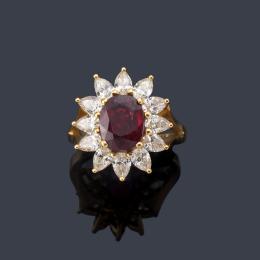 Lote 2213: Anillo con rubí talla oval de aprox. 2,46 ct con orla de diamantes talla perilla de aprox. 2,00 ct en total. Certificado AIG.