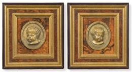Lote 1047
Dos medallones de bronce en relieve de niños, Francia S. XIX