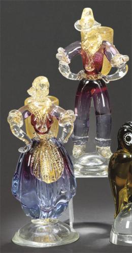 Lote 1253: Pareja de violeteros en cristal de Murano en forma de campesinos