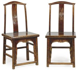 Lote 1394
Pareja de sillas chinas en madera de olmo Dinastía Qing ff. S. XIX.