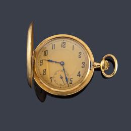 Lote 2517: Reloj saboneta con caja en oro amarillo de 18 K.