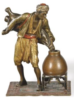 Lote 1039: "Arabe Llenando una Vasija" en bronce policromado, Viena h. 1900.