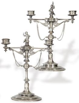 Lote 1135: Pareja de candelabros alfonsinos de plata española punzonada de José Agruña, Madrid Villa y Corte 1883.