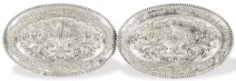 Lote 1165: Pareja de bandejas ovales de plata española punzonada con marca ilegible, Madrid Villa y Corte 1914.