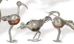 Lote 1167
Tres aves zancudas en plata mejicana punznonada Ley Sterling y piedras duras.