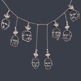 Lote 2040: Collar masculino realizado en platino y con ocho rostros 'vaciados' de los Reyes de principios del S.XX.