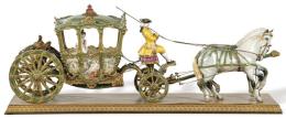 Lote 1059: Gran carruaje en porcelana esmaltada y vidriada. Réplica de carruaje del siglo XX de I. Fabrie.