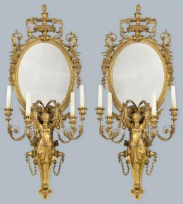 Lote 1089: Pareja de cornucopias victorianas en madera tallada y dorada con cuatro brazos de luz.
Inglaterra, segunda mitad S. XIX