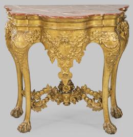 Lote 1241: Consola Carlos III en madera tallada y dorada, con tapa marmorizada.
España, S. XVIII