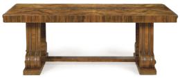 Lote 1293: Mesa de comedor art decó en madera de nogal, sobre dos grandes pedestales apoyados en volutas.
Años 30