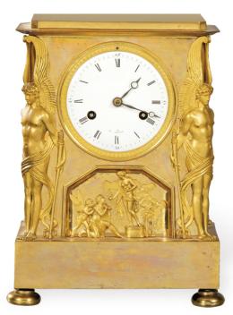 Lote 1468: Reloj de viaje DirectorioReloj de sobremesa en bronce dorado, pavonado y cincelado. París alrededor de 1795