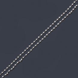 Lote 2045: Cadena de perlitas con eslabones de platino.