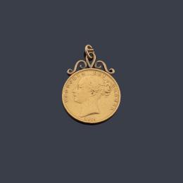Lote 2564: Colgante de moneda libra inglesa de la reina Victoria en oro de 22 K y colgante en oro de 18 K.
