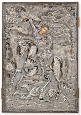 Lote 1235: Icono turco "Santiago Matamoros" en madera pintada al temple con funda de plata punzonada Ley 800 segunda mitad S. XIX.